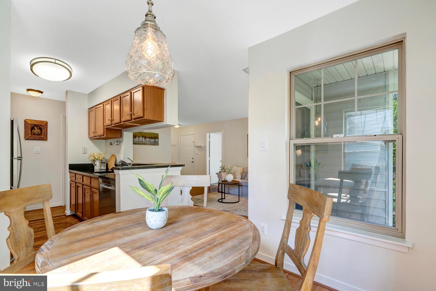 1791 Jonathan Way, Unit 1791C Reston, VA 20190 - Photo 15 of 58 a view of a dining room with furniture