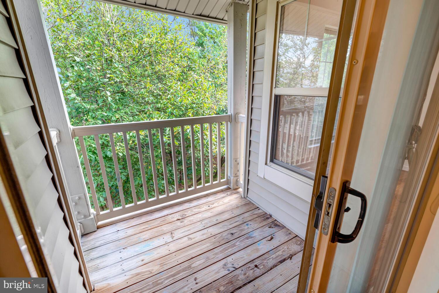 1791 Jonathan Way, Unit 1791C Reston, VA 20190 - Photo 24 of 58 a view of balcony with wooden floor