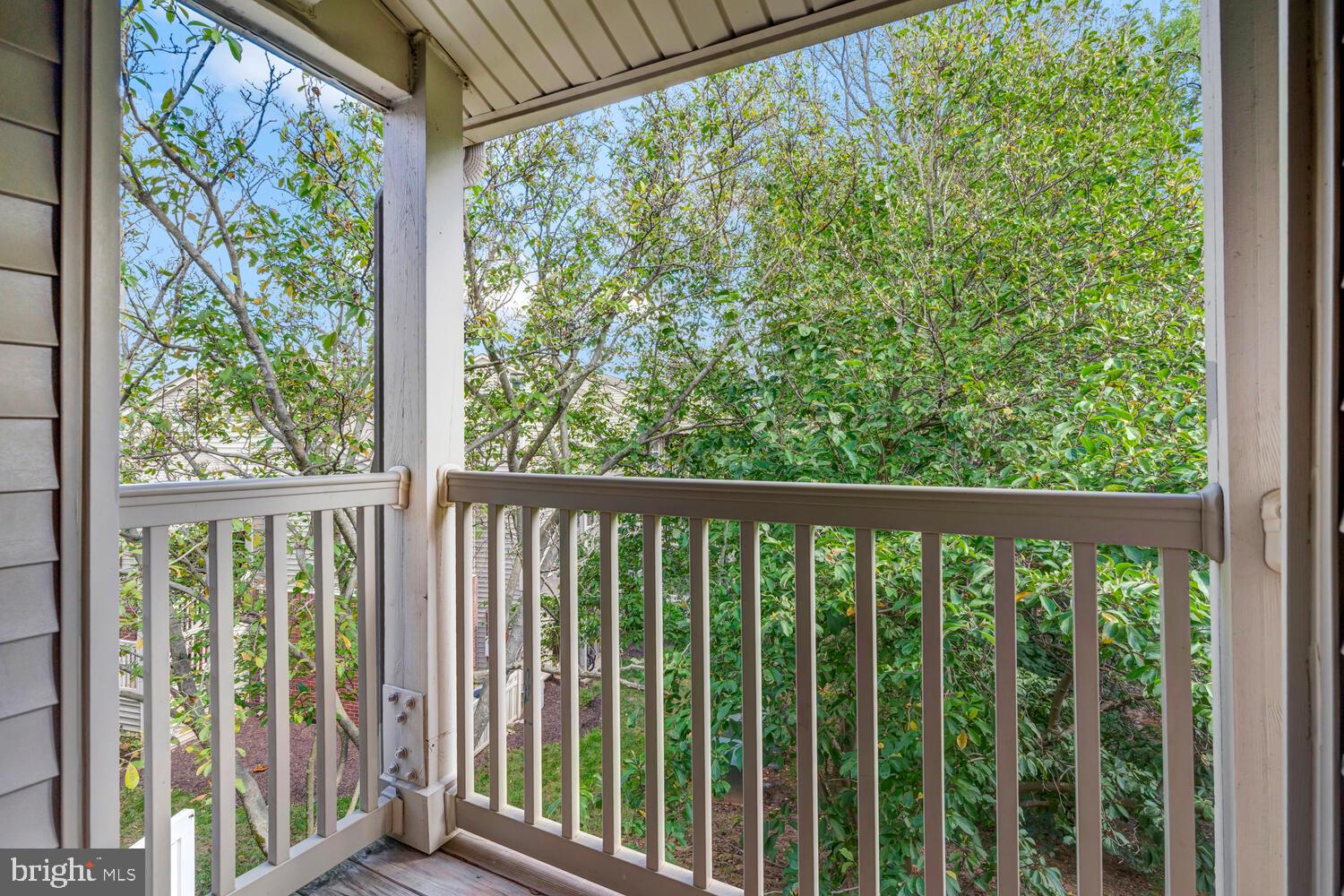 1791 Jonathan Way, Unit 1791C Reston, VA 20190 - Photo 25 of 58 a view of a balcony with wooden floor