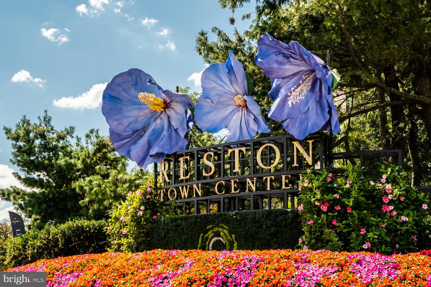 1791 Jonathan Way, Unit 1791C Reston, VA 20190 - Photo 38 of 58 a view of a bunch of flowers and trees in patio