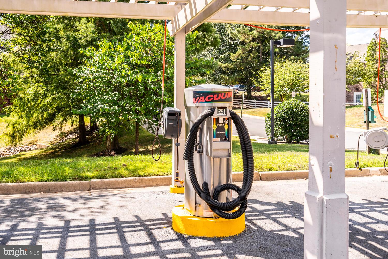 1791 Jonathan Way, Unit 1791C Reston, VA 20190 - Photo 44 of 58 a view of a swimming pool with a garden and plants