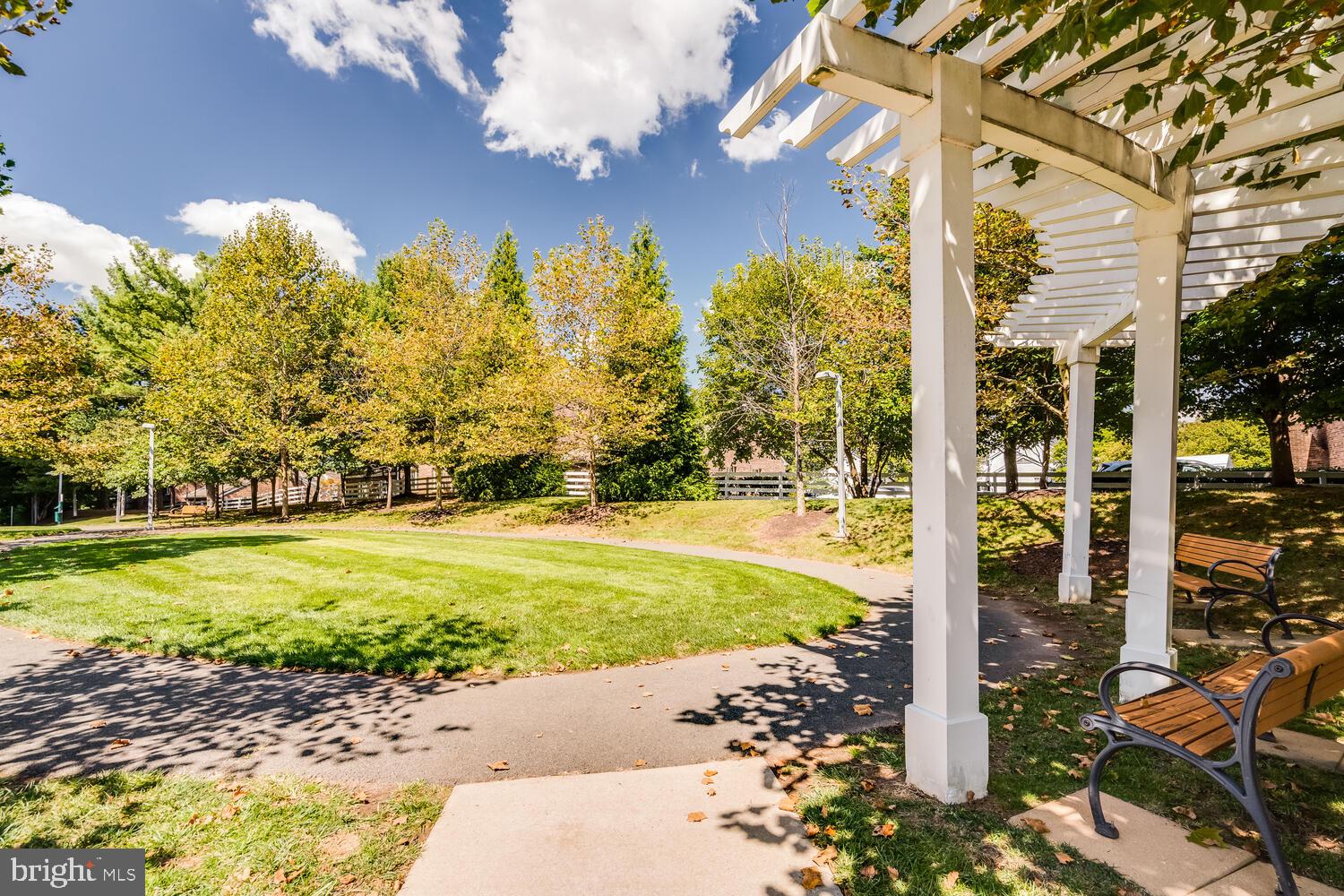 1791 Jonathan Way, Unit 1791C Reston, VA 20190 - Photo 49 of 58 a view of a yard with an outdoor space