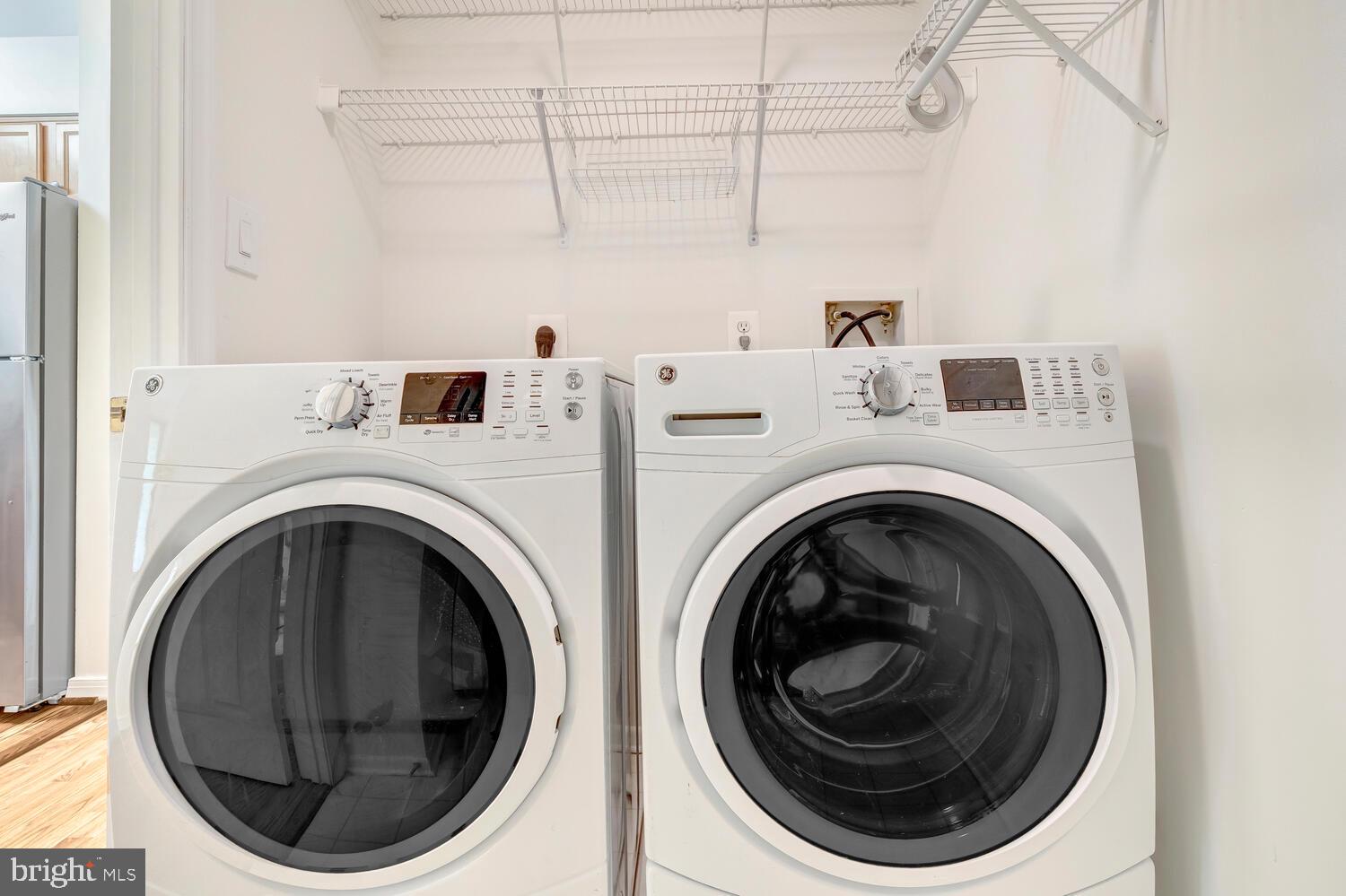 1791 Jonathan Way, Unit 1791C Reston, VA 20190 - Photo 55 of 58 a utility room with dryer and washer