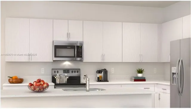 a kitchen with a cabinets and a fireplace