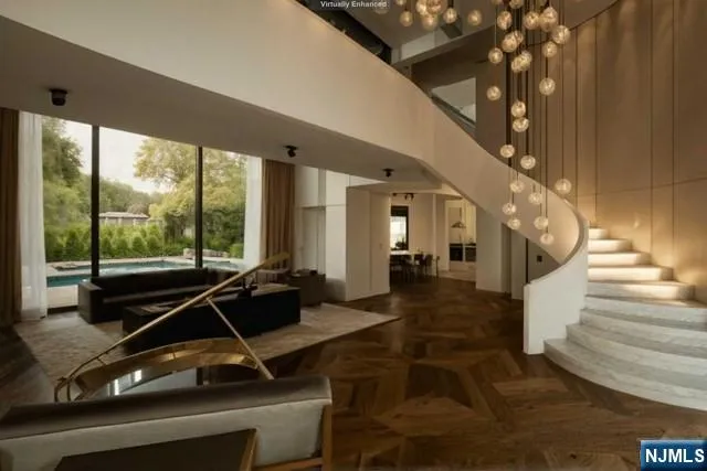 a room with gym equipment and large windows