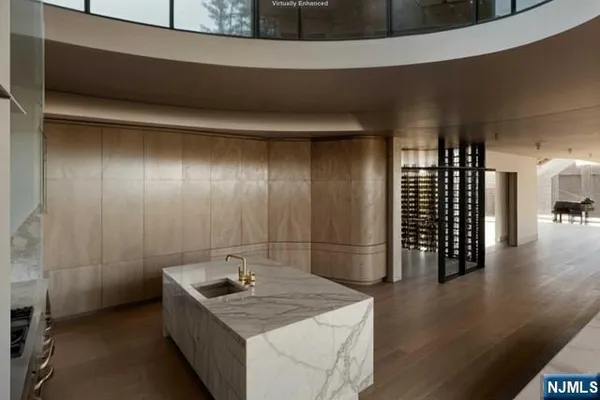 a kitchen with a stove and refrigerator