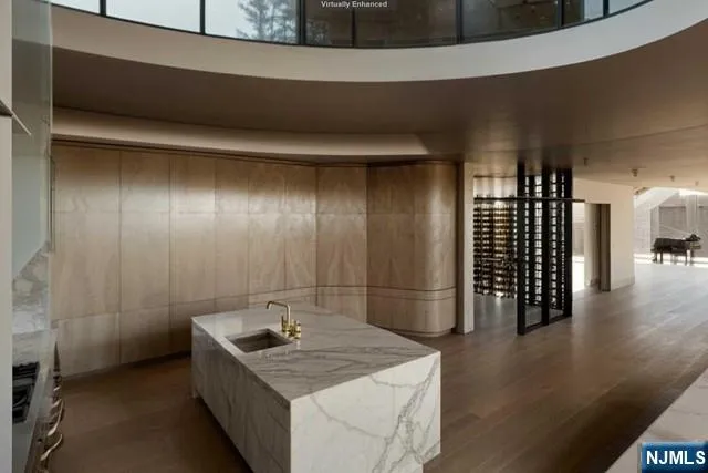 a kitchen with a stove and refrigerator