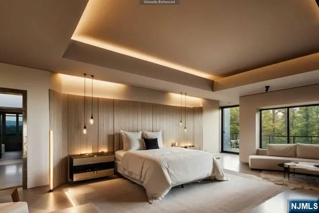 a spacious bedroom with a bed and large windows