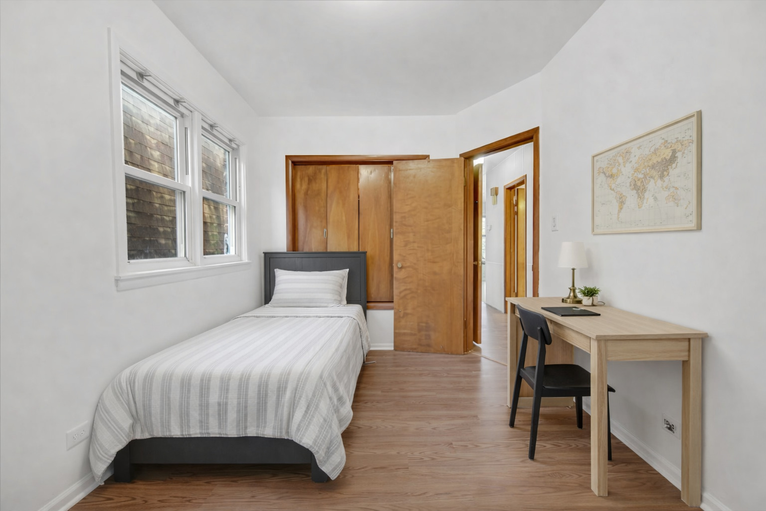 3329 South Racine Avenue Chicago, IL 60608 - Photo 20 of 33 a bedroom with a bed and a table