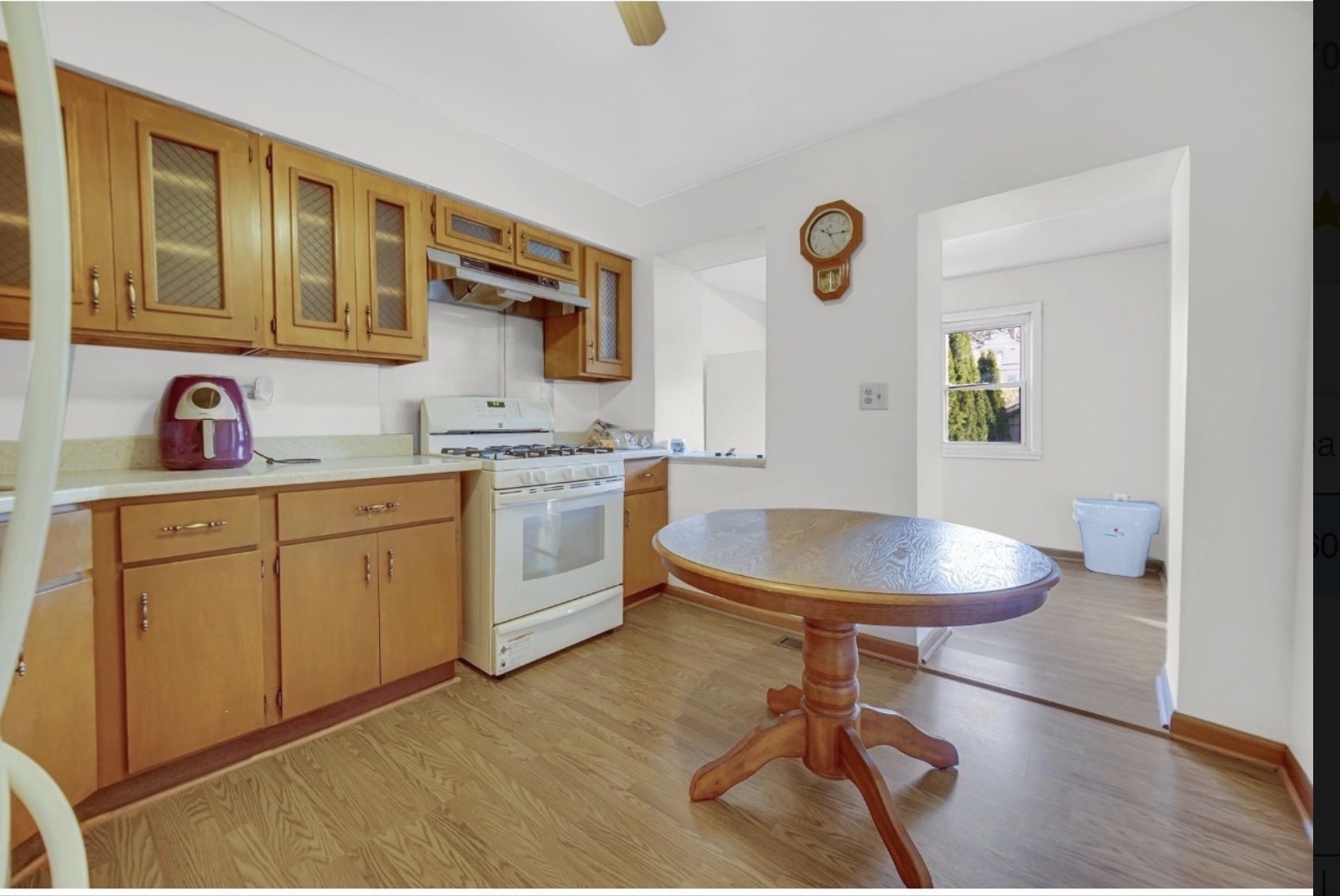 3329 South Racine Avenue Chicago, IL 60608 - Photo 5 of 33 a kitchen with a sink cabinets and window