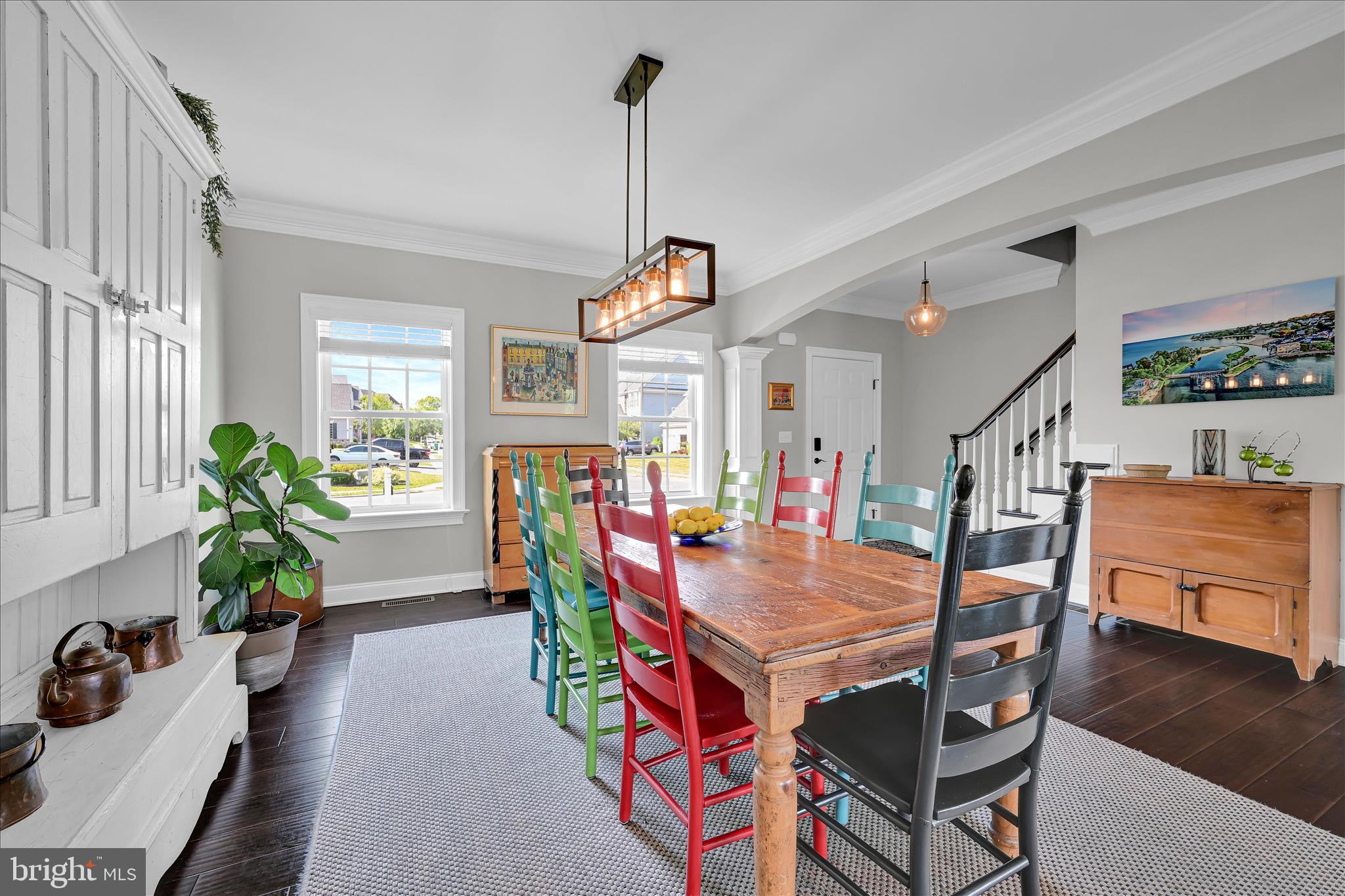 678 Integrity Drive Lititz, PA 17543 - Photo 4 of 51 a dining room with furniture potted plants and wooden floor