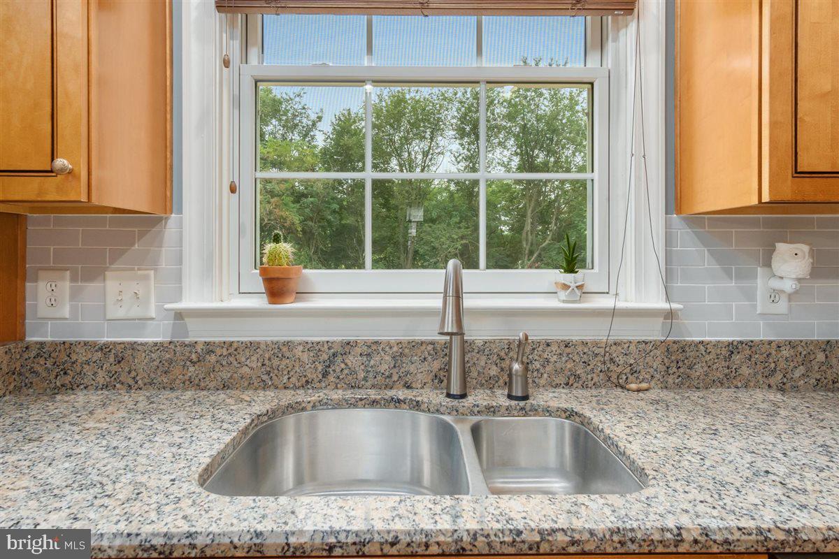 20239 Locust Grove Road Rohrersville, MD 21779 - Photo 16 of 51 a kitchen sink sitting next to a window