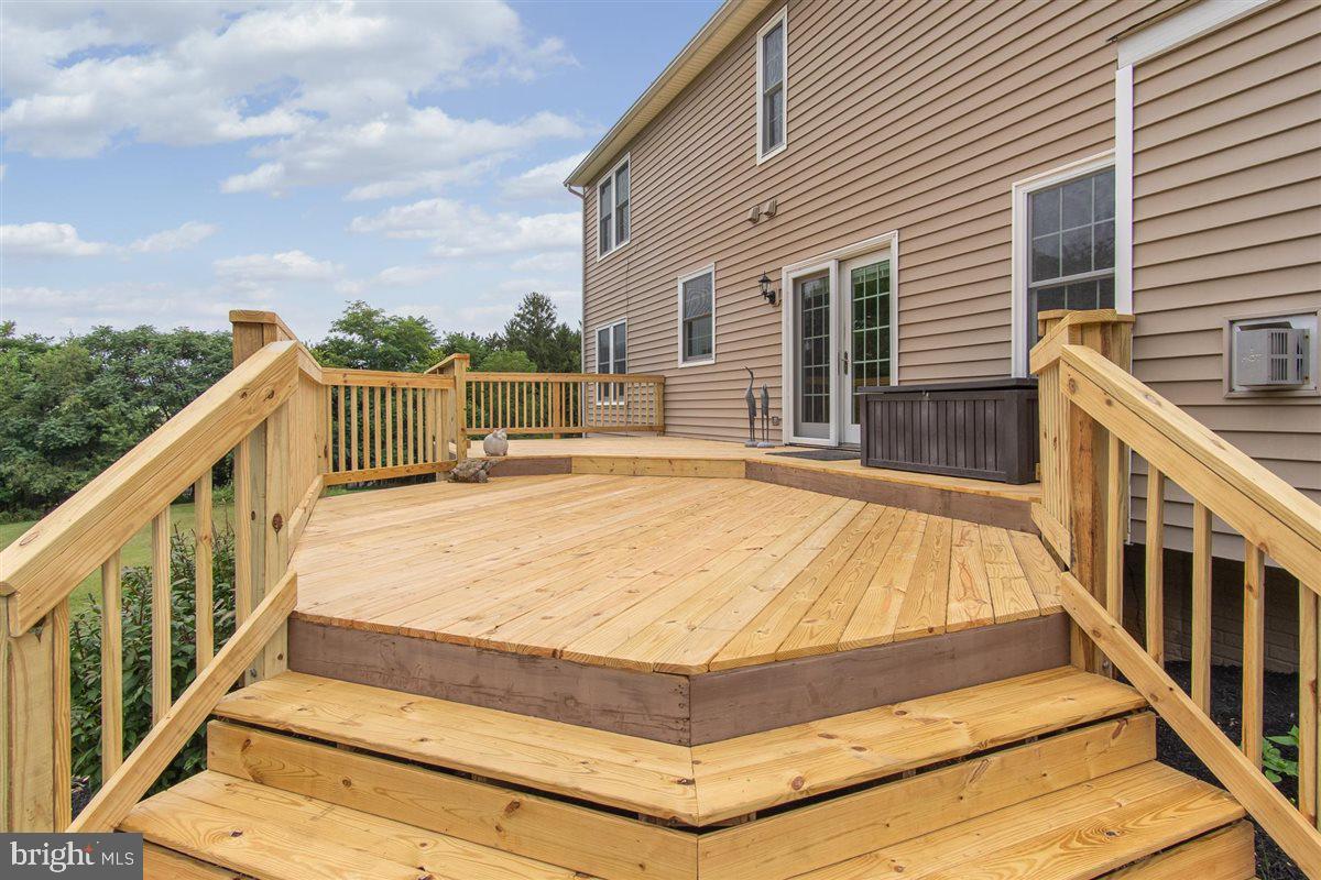 20239 Locust Grove Road Rohrersville, MD 21779 - Photo 43 of 51 a view of balcony with wooden floor and fence
