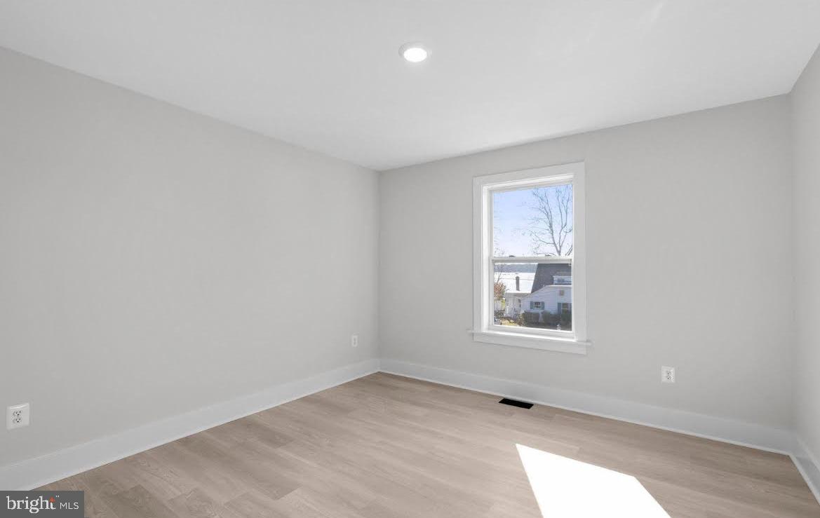 4938 Rullman Road Shady Side, MD 20764 - Photo 20 of 29 an empty room with a window