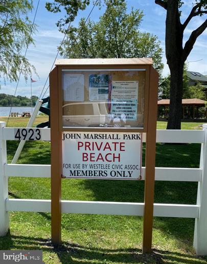 4938 Rullman Road Shady Side, MD 20764 - Photo 23 of 29 a sign on the side of a building