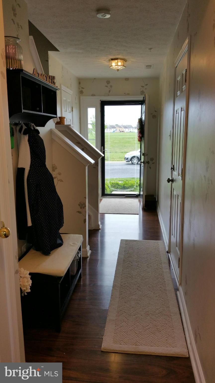 917 Tipton Road Baltimore, MD 21220 - Photo 2 of 24 a view of hallway with furniture and a window