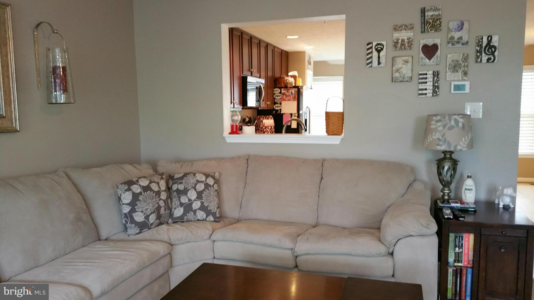 917 Tipton Road Baltimore, MD 21220 - Photo 17 of 24 a living room with furniture and wooden floor