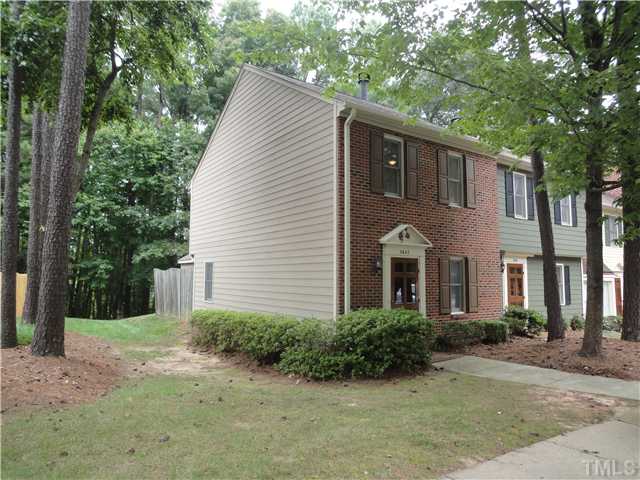 5642 Hamstead Crossing Raleigh, NC 27612 - Photo 3 of 24 Big side yard for this brick front end unit & lake access behind home.