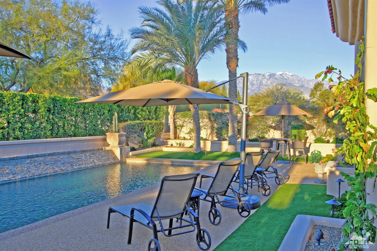250 Loch Lomond Road Rancho Mirage, CA 92270 - Photo 2 of 33 a view of yard with seating area and trees around