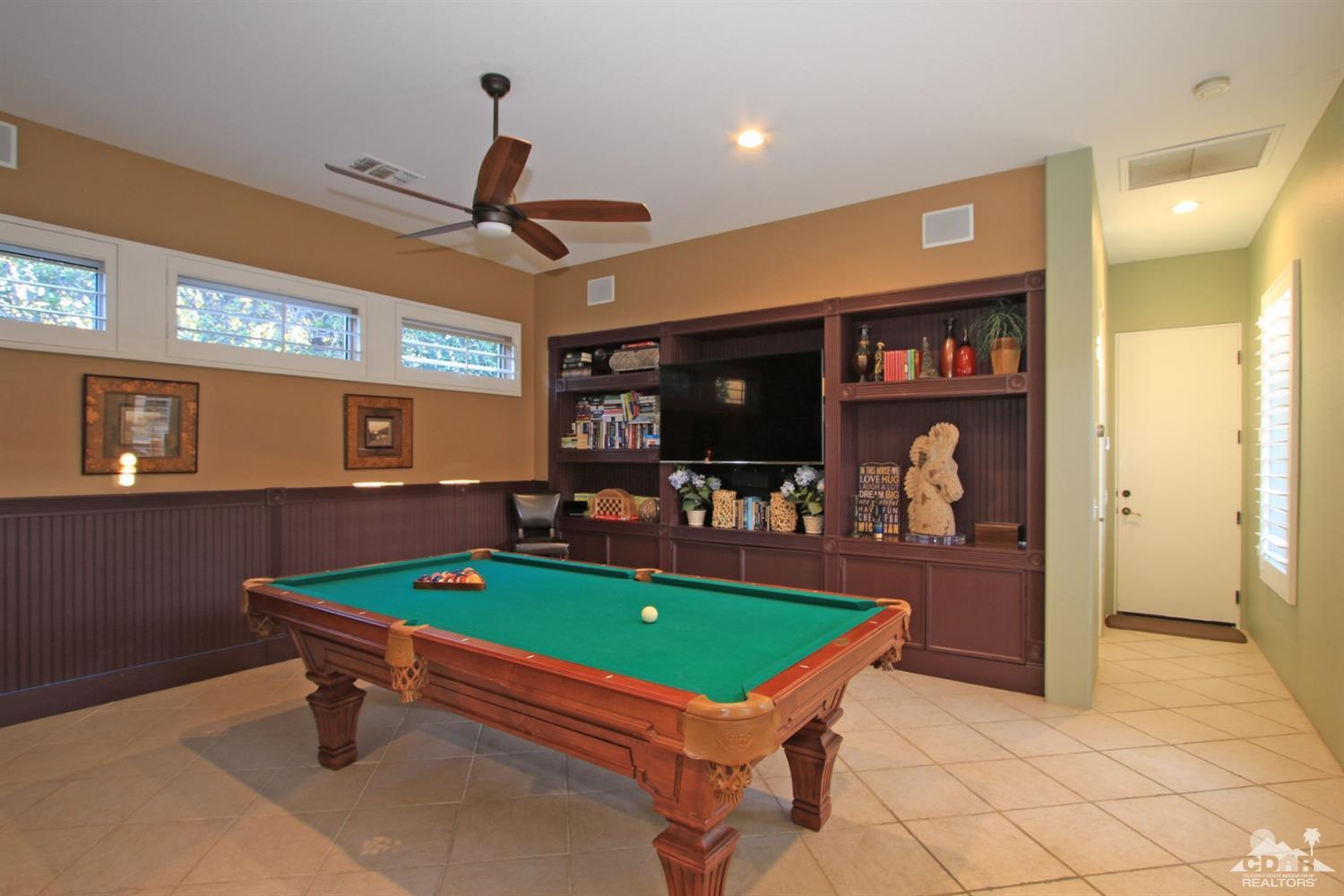 250 Loch Lomond Road Rancho Mirage, CA 92270 - Photo 17 of 33 a room with pool table and windows