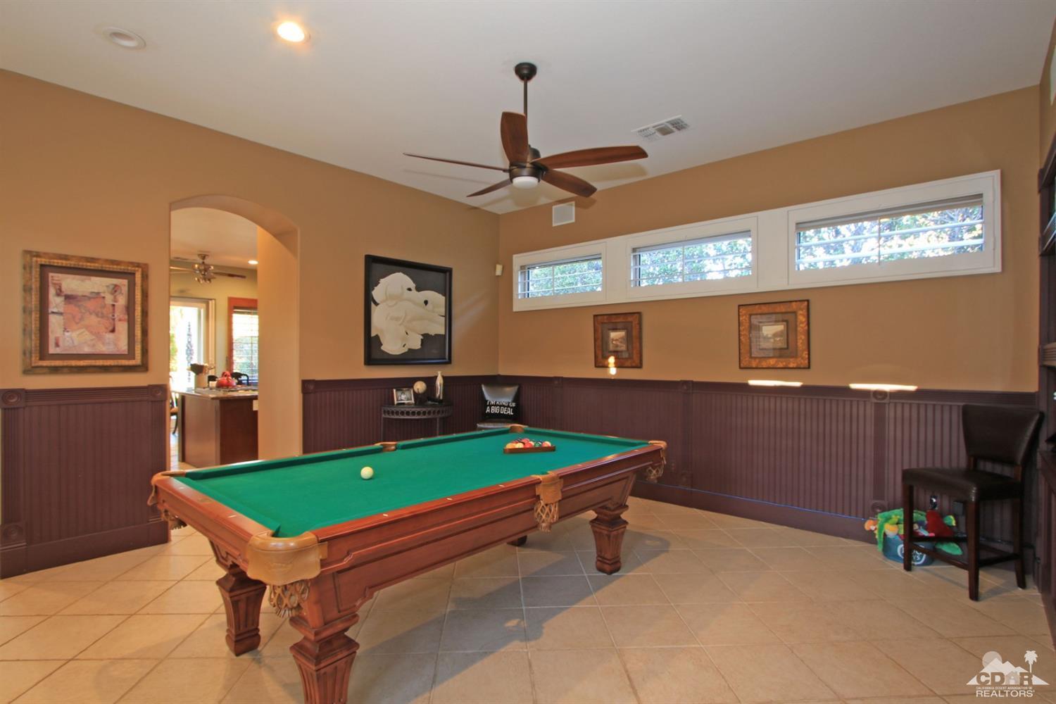 250 Loch Lomond Road Rancho Mirage, CA 92270 - Photo 18 of 33 a room with pool table and windows