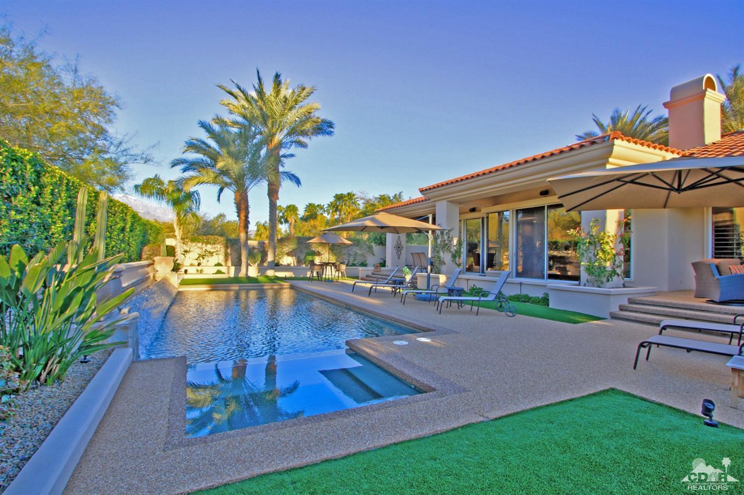 250 Loch Lomond Road Rancho Mirage, CA 92270 - Photo 29 of 33 a view of outdoor space yard deck patio and swimming pool