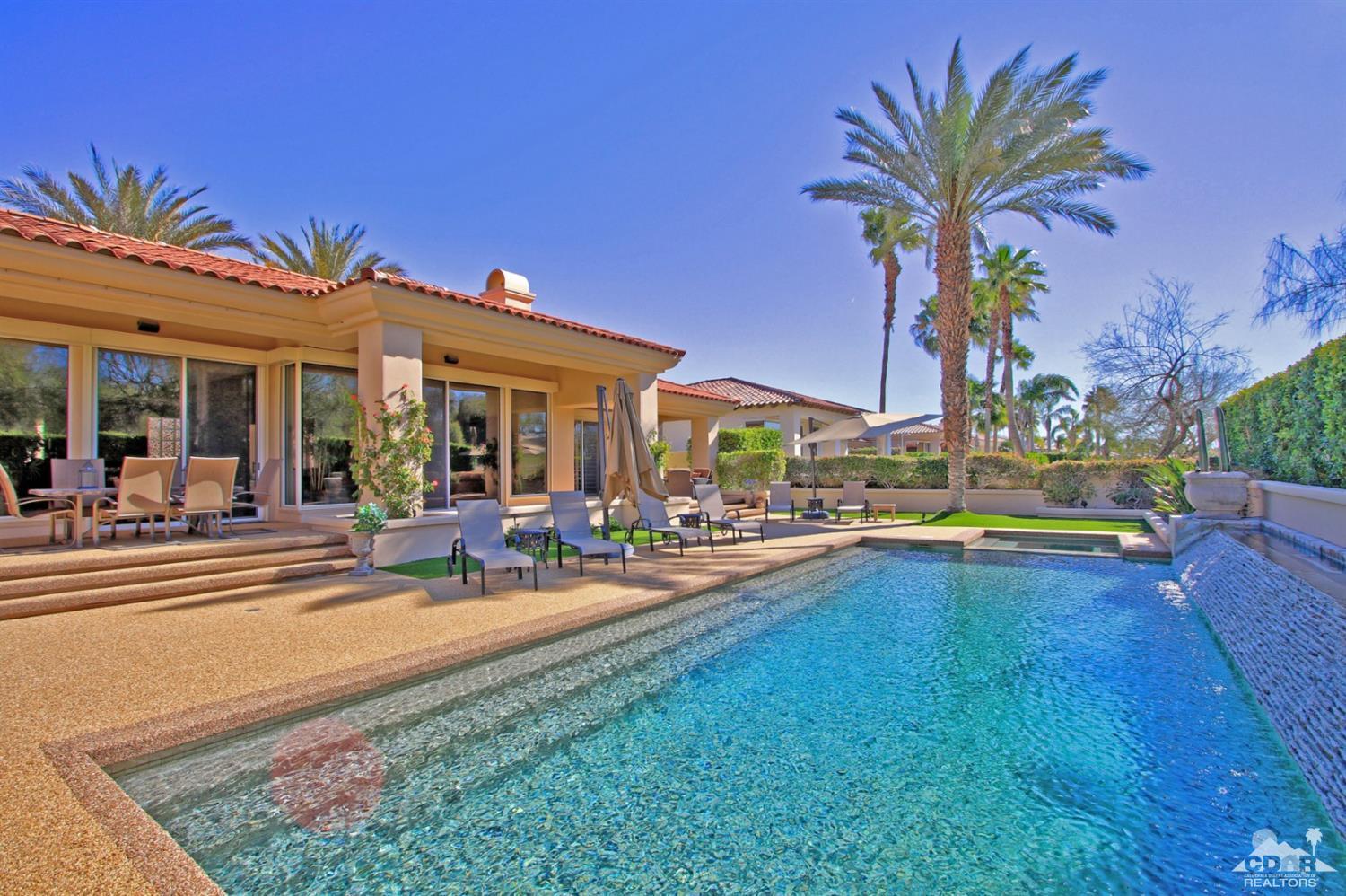 250 Loch Lomond Road Rancho Mirage, CA 92270 - Photo 4 of 33 a view of a house with swimming pool and sitting area