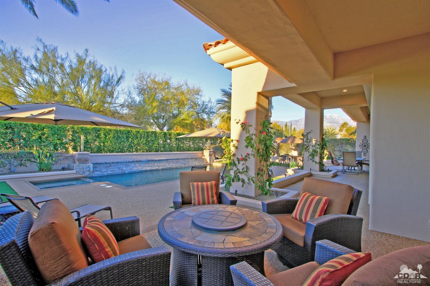 250 Loch Lomond Road Rancho Mirage, CA 92270 - Photo 31 of 33 a outdoor living space with furniture and a potted plant