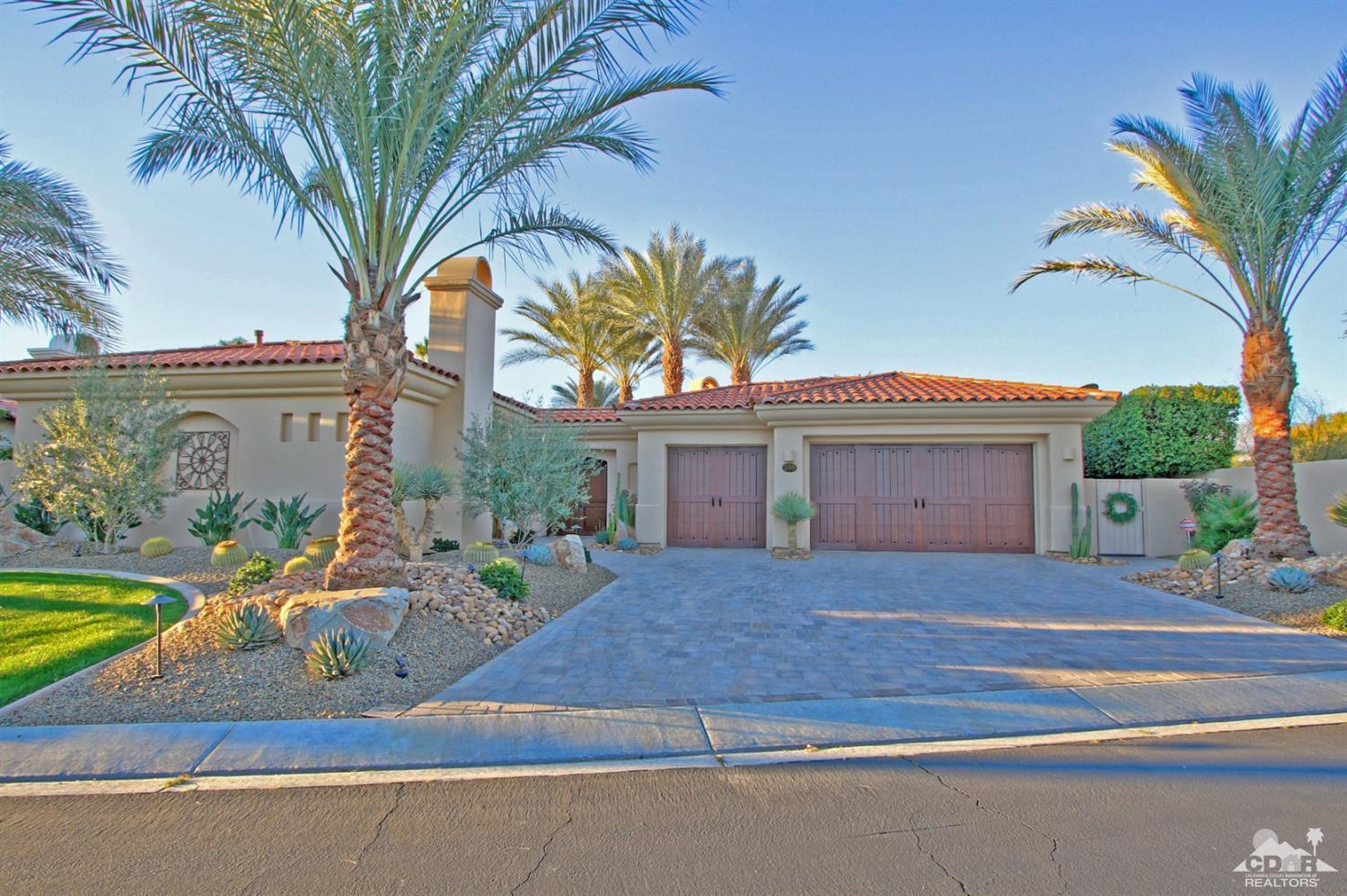 250 Loch Lomond Road Rancho Mirage, CA 92270 - Photo 5 of 33 a front view of a house with garden