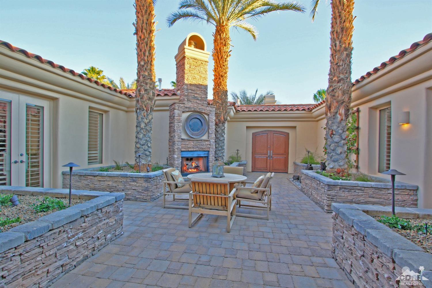 250 Loch Lomond Road Rancho Mirage, CA 92270 - Photo 6 of 33 a view of a house with backyard and sitting area