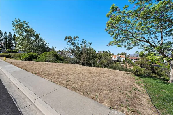 a view of a backyard of a house