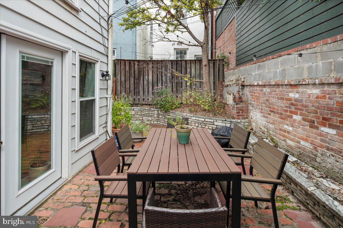 304 2nd Street Southeast Washington, DC 20003 - Photo 25 of 70 a view of balcony with wooden floor and outdoor seating