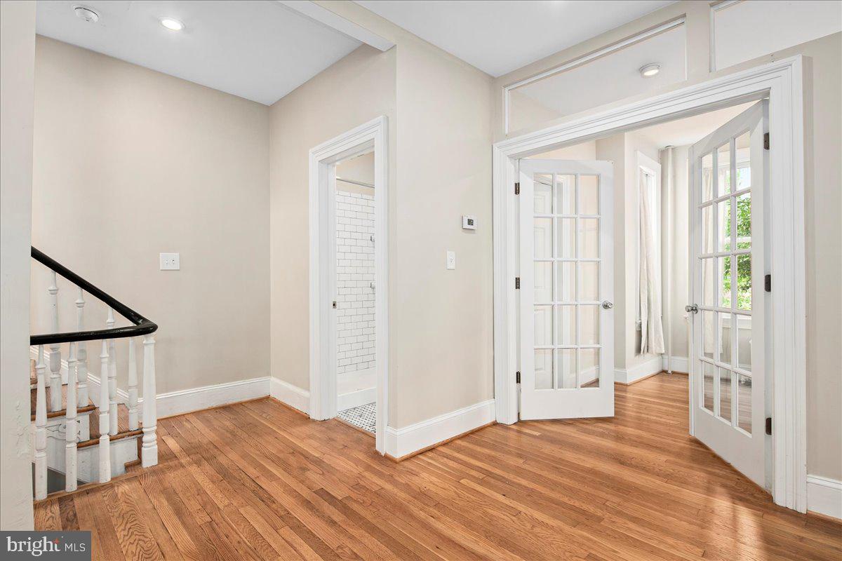 304 2nd Street Southeast Washington, DC 20003 - Photo 31 of 70 a view of a room with wooden floor and staircase