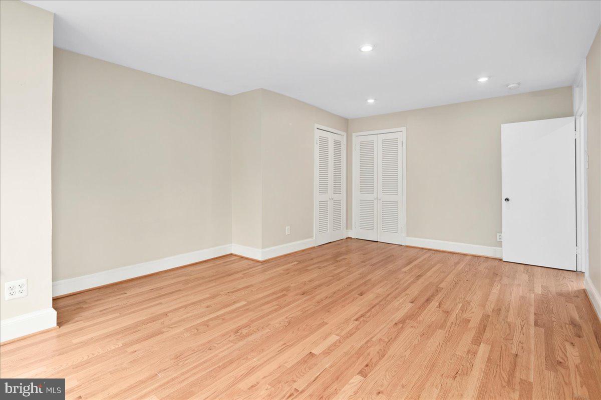 304 2nd Street Southeast Washington, DC 20003 - Photo 45 of 70 a view of empty room with wooden floor and fan