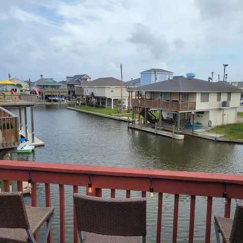 a view of a lake from a balcony