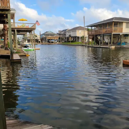 a front view of building with yard