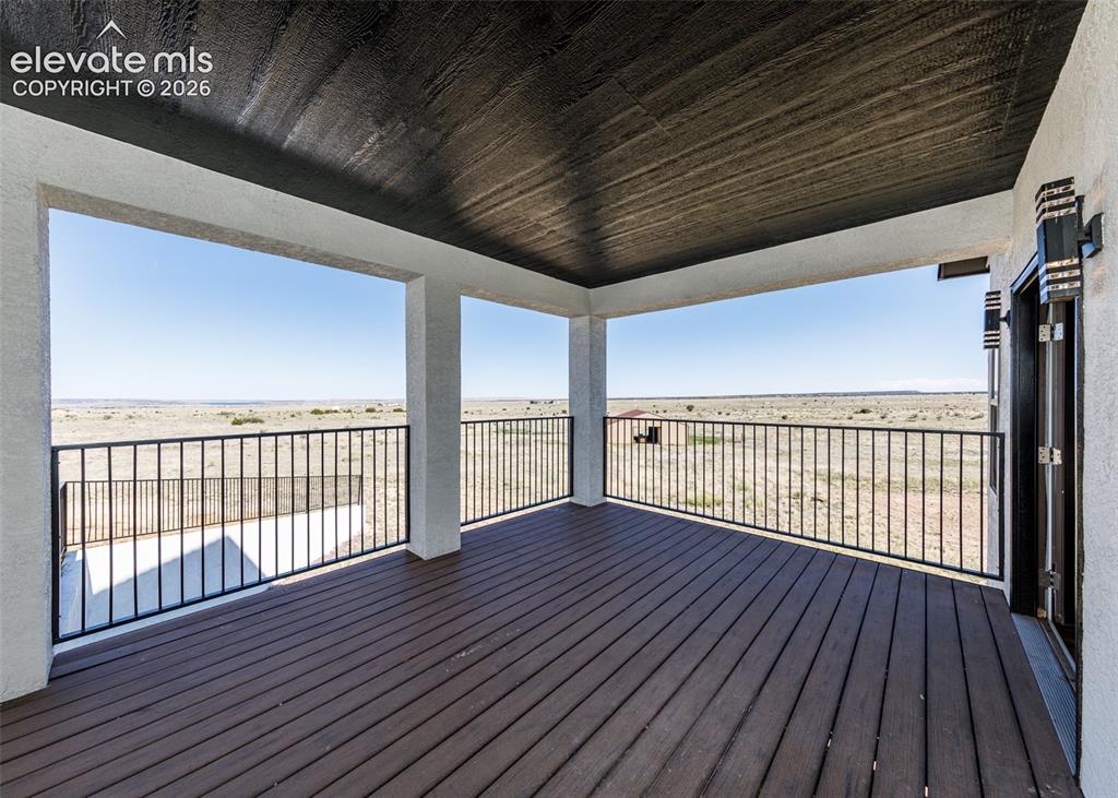 1120 Newton Road Pueblo, CO 81005 - Photo 11 of 46 wooden floor in an empty room with wooden floor