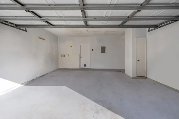 a view of a room with wooden walls