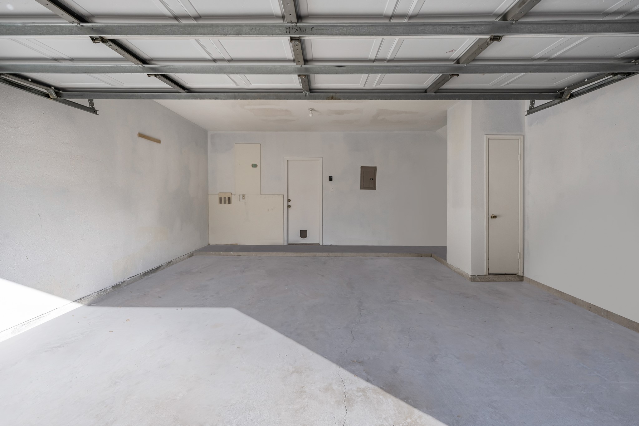 9800 Pagewood Lane, Unit 3103 Houston, TX 77063 - Photo 24 of 27 a view of a room with wooden walls