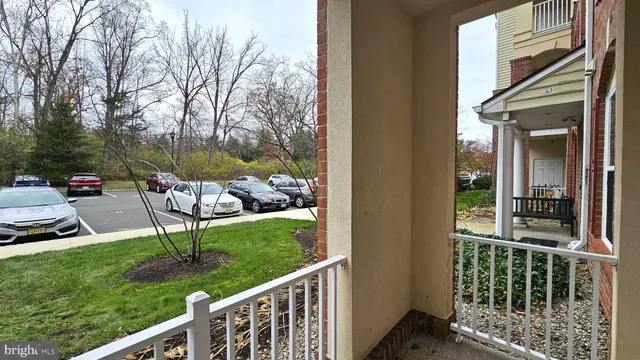 a view of a chair and table in the deck