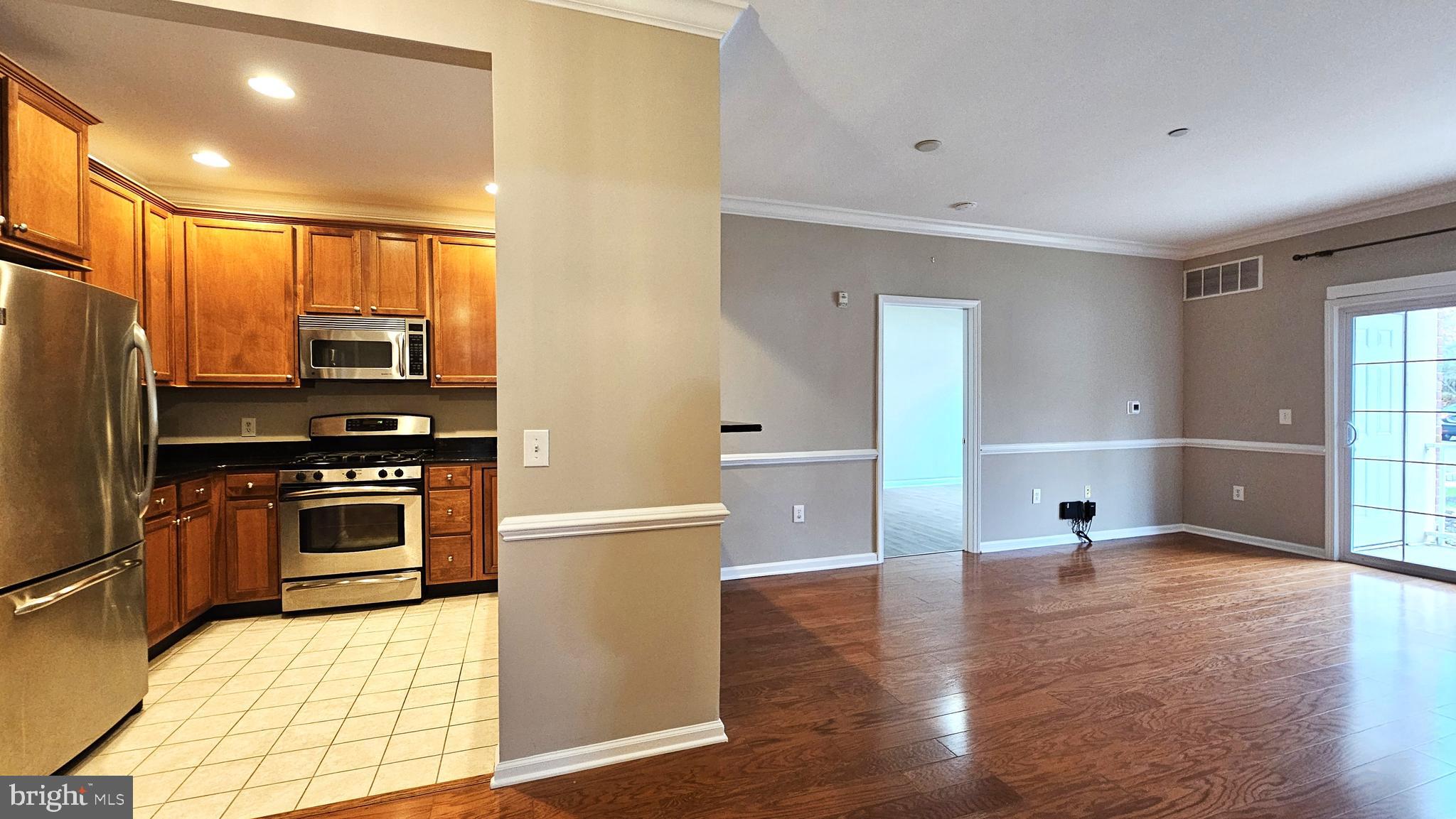 1121 Colts Circle, Unit P Lawrenceville, NJ 08648 - Photo 2 of 34 a kitchen with stainless steel appliances a stove a refrigerator and a sink