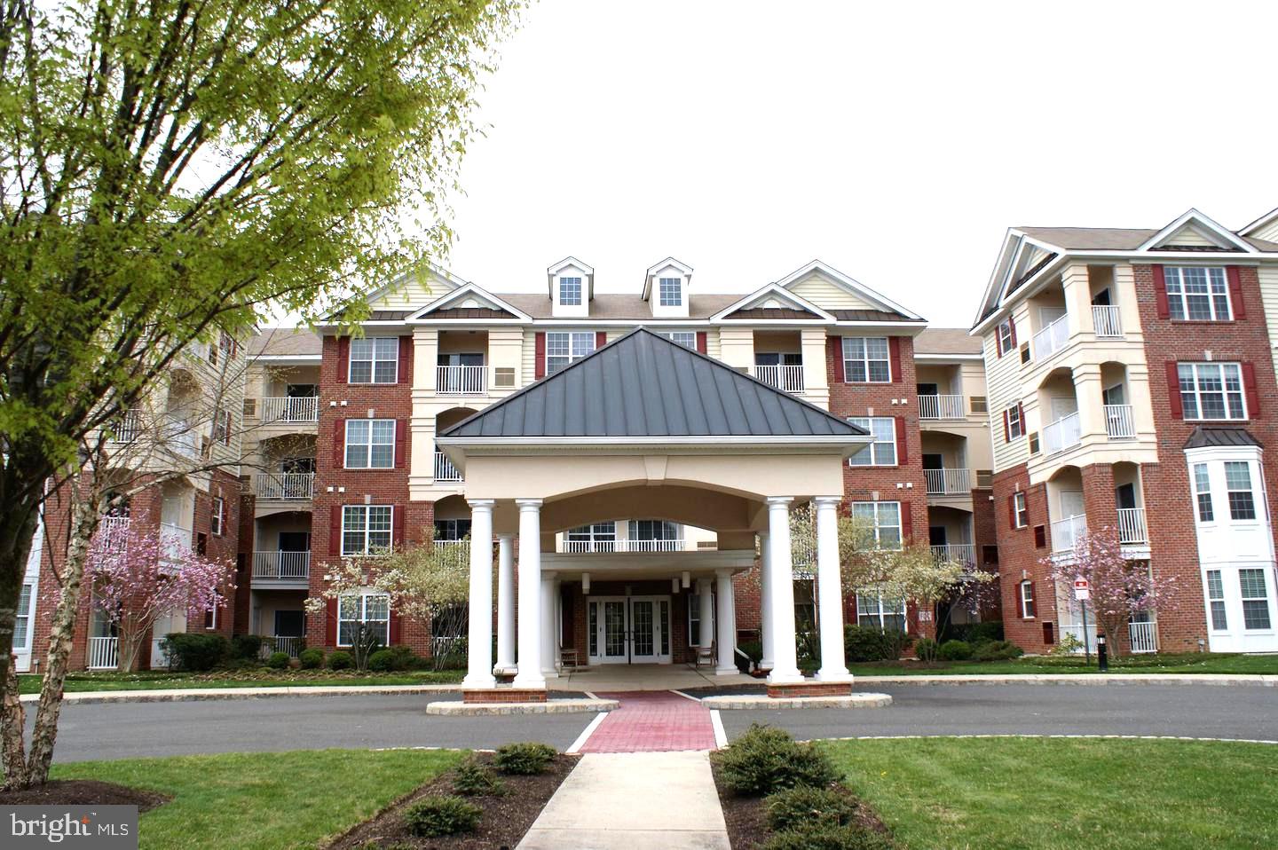 1121 Colts Circle, Unit P Lawrenceville, NJ 08648 - Photo 22 of 34 a front view of a building and front view of a building