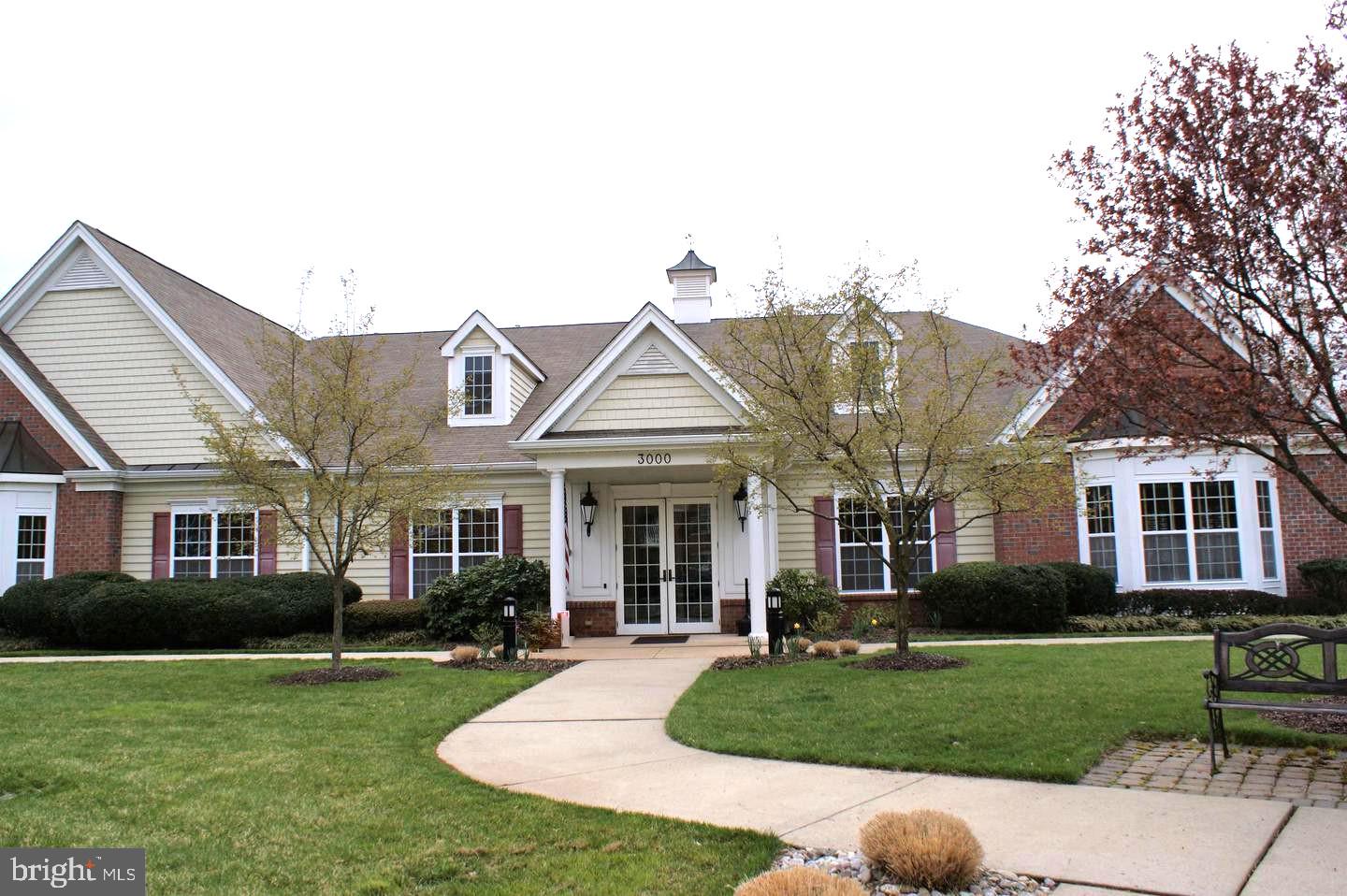 1121 Colts Circle, Unit P Lawrenceville, NJ 08648 - Photo 29 of 34 a front view of a house with a yard