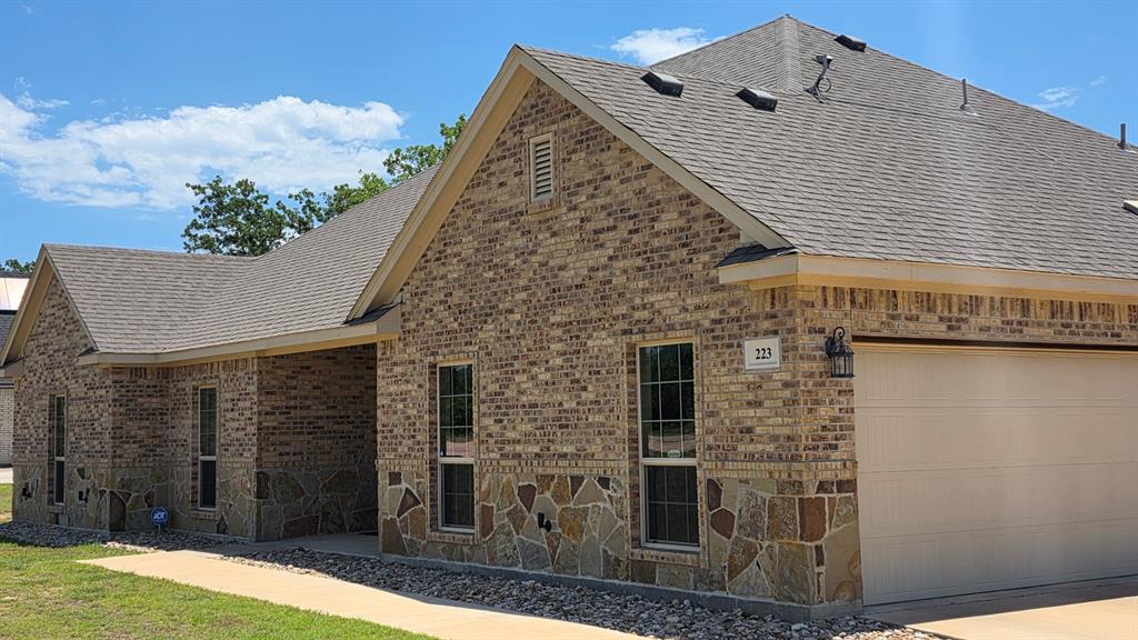 223 Cottongame Road Weatherford, TX 76088 - Photo 6 of 39 a view of a house with backyard