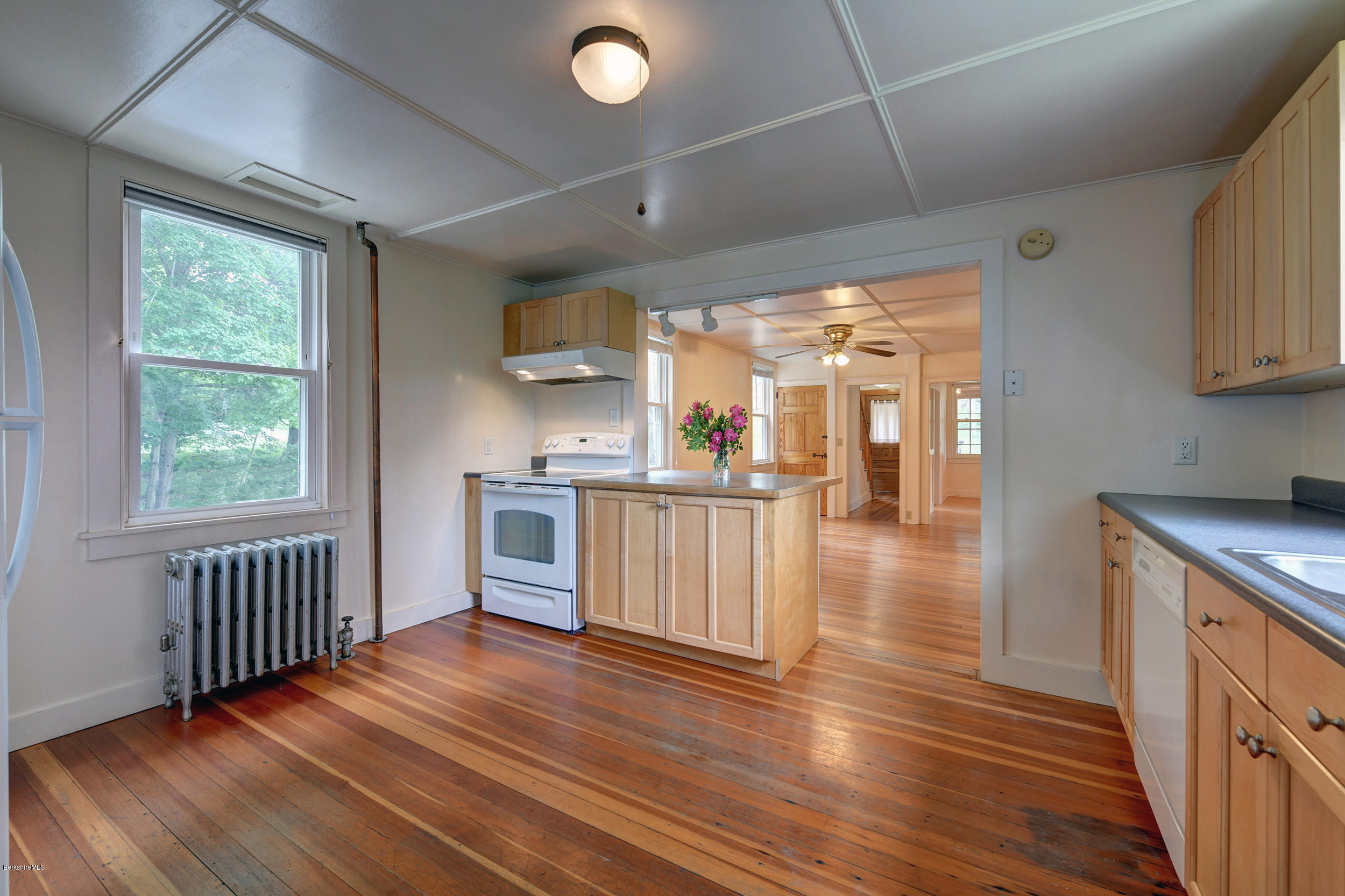 23 Glendale Road Stockbridge, MA 01262 - Photo 11 of 30 a view of a kitchen with wooden floor and a sink