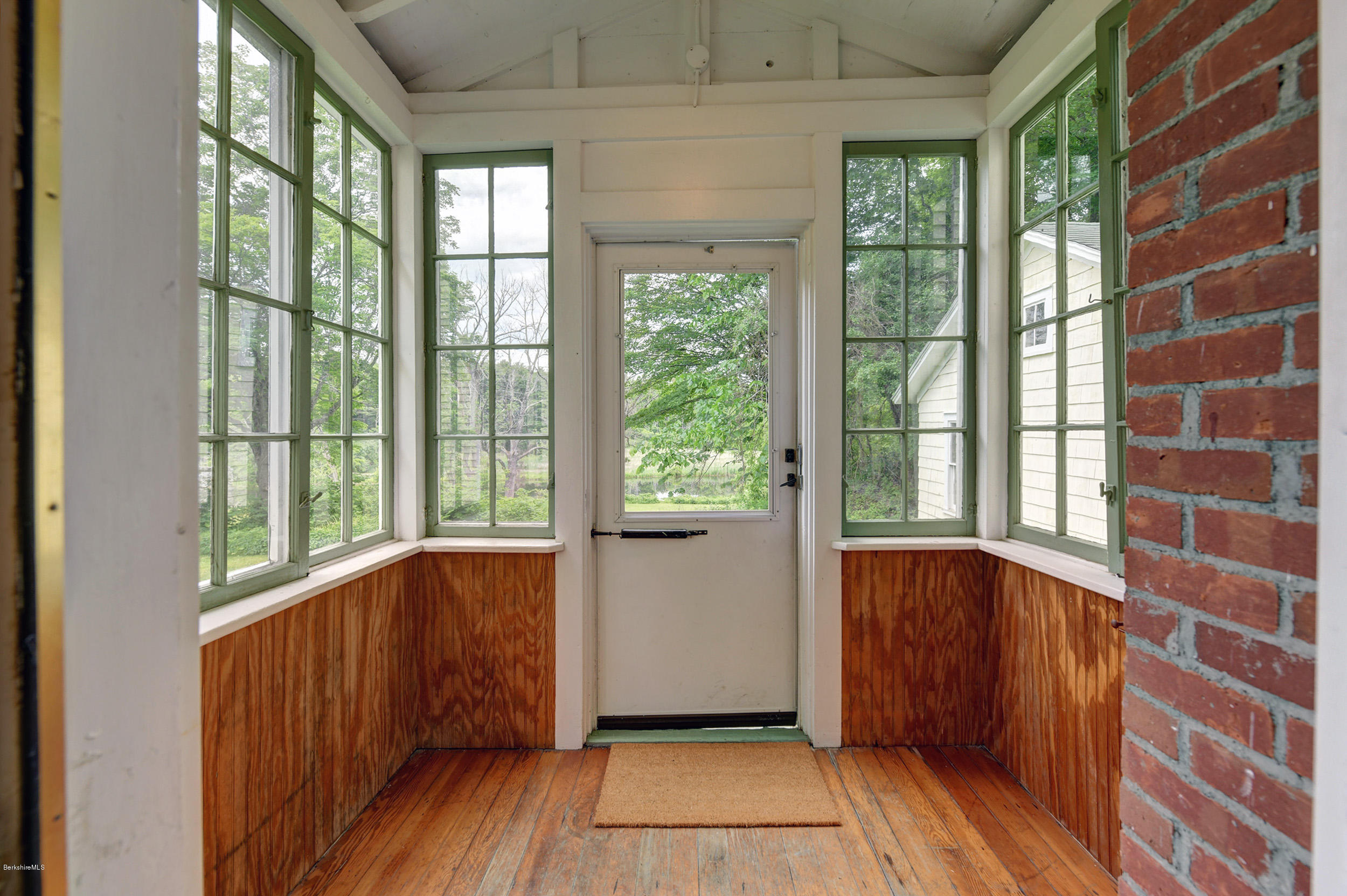 23 Glendale Road Stockbridge, MA 01262 - Photo 14 of 30 a view of a door and wooden floor in a room