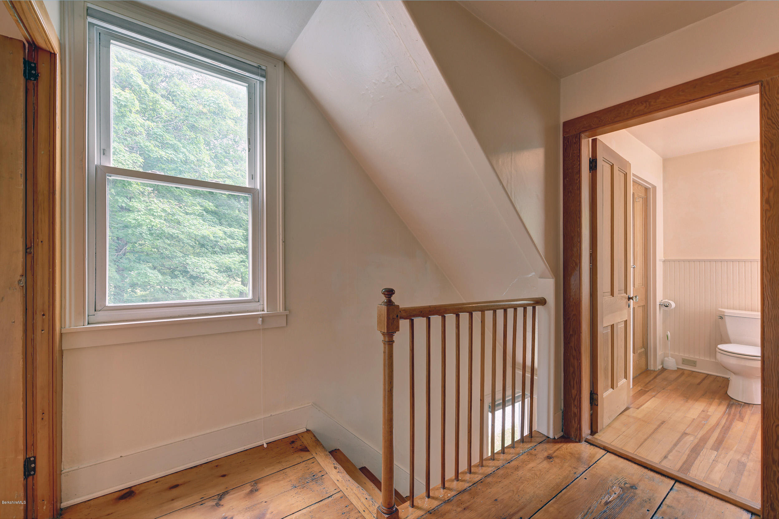 23 Glendale Road Stockbridge, MA 01262 - Photo 18 of 30 a view of a room with a large window and wooden floor