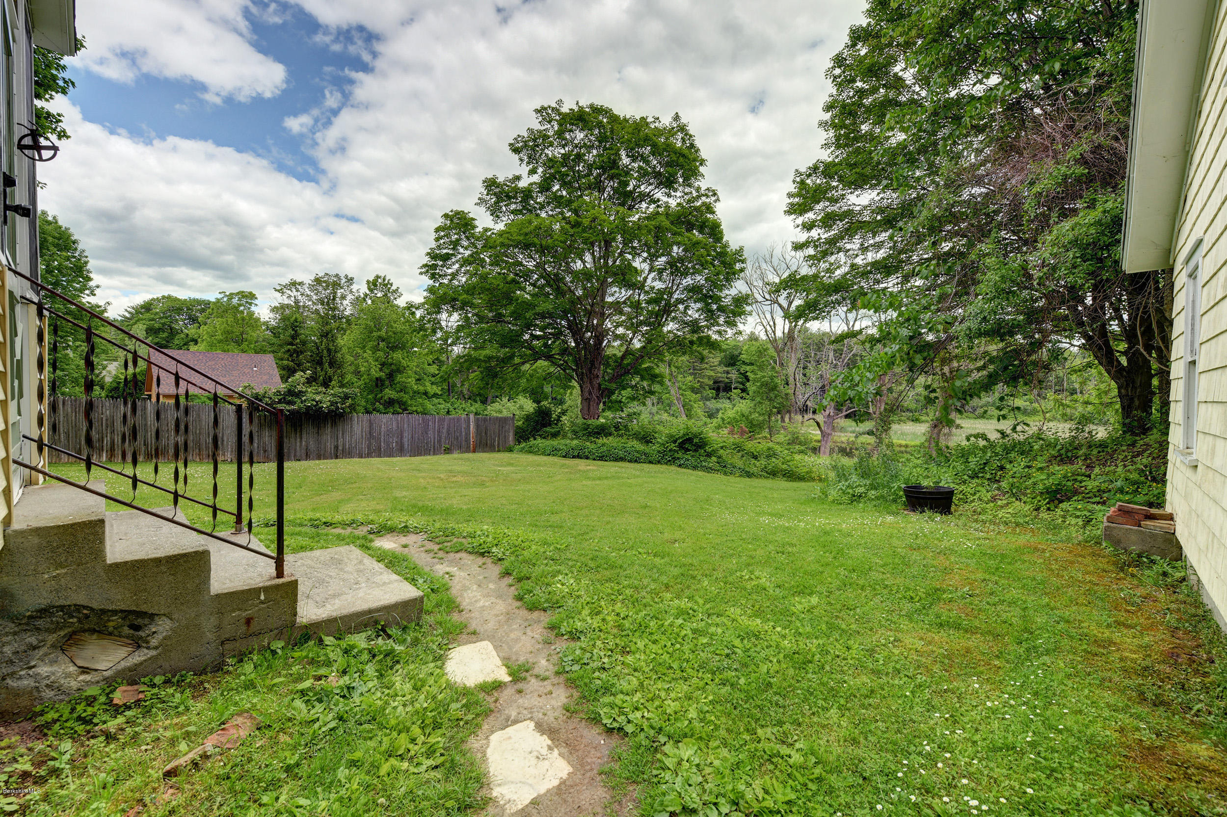 23 Glendale Road Stockbridge, MA 01262 - Photo 28 of 30 a view of a house with a backyard