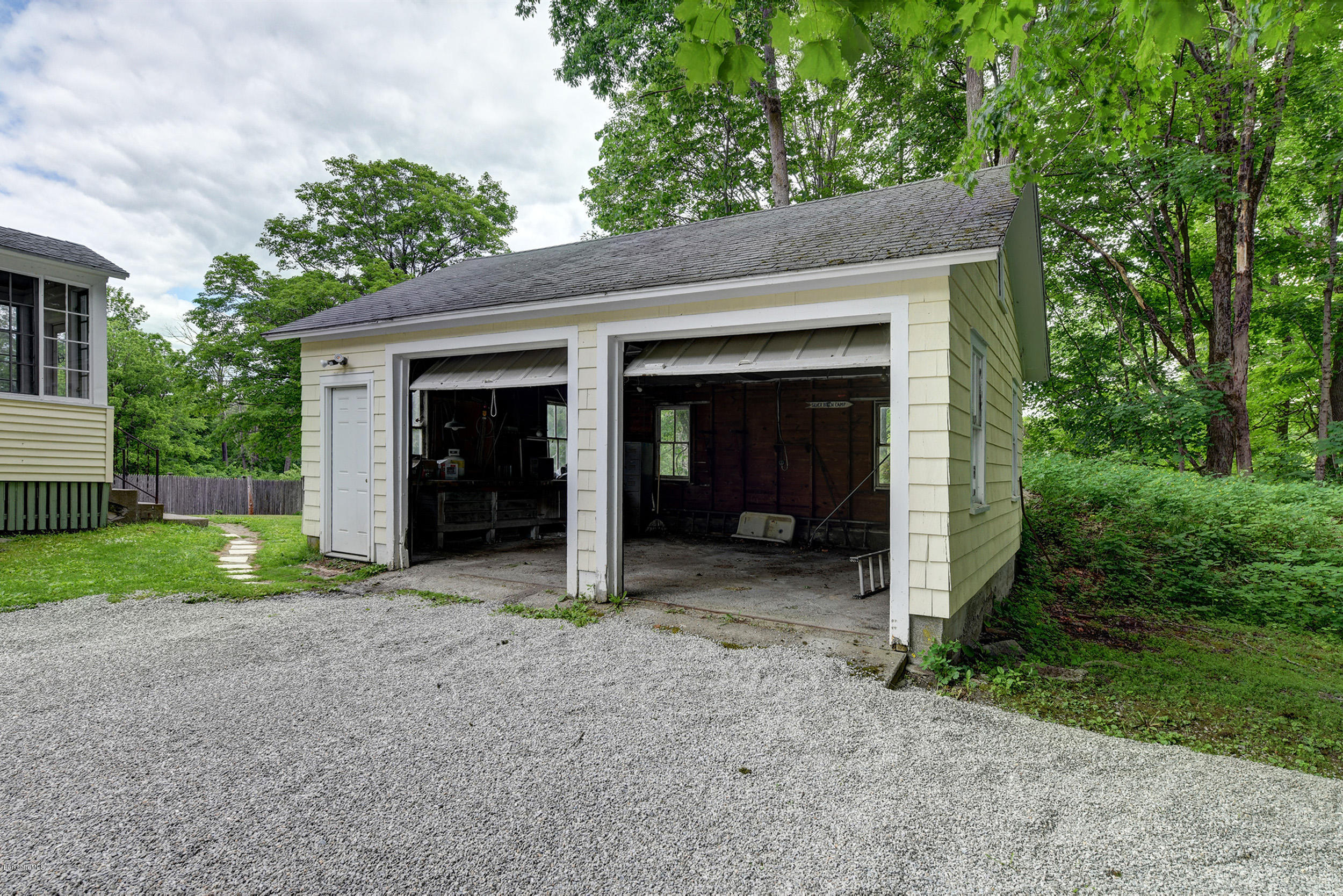 23 Glendale Road Stockbridge, MA 01262 - Photo 30 of 30 a view of a house with a yard and garage