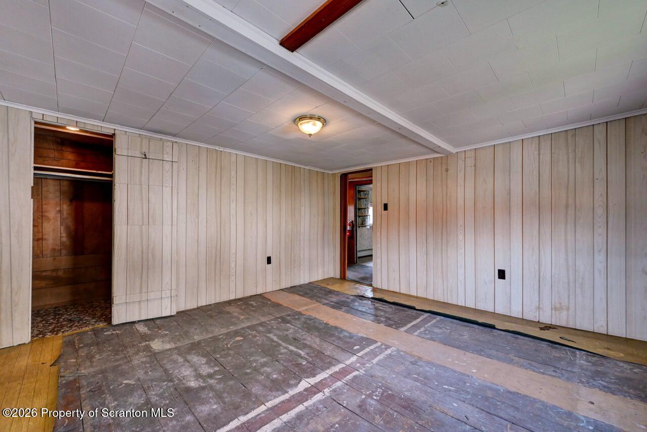 18 Green Ridge Street Scranton, PA 18509 - Photo 19 of 29 a view of an empty room with wooden floor